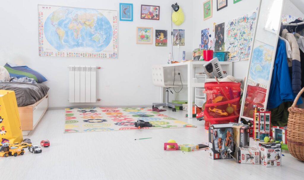 pile of assorted-color toy boxes - kids playroom