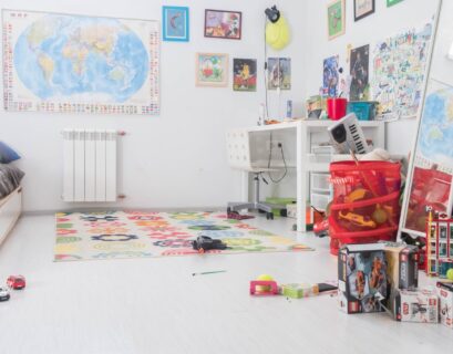pile of assorted-color toy boxes - kids playroom