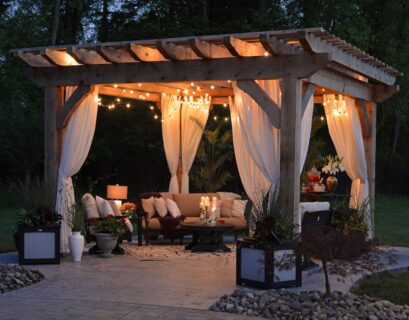 photo of gazebo with curtain and string lights