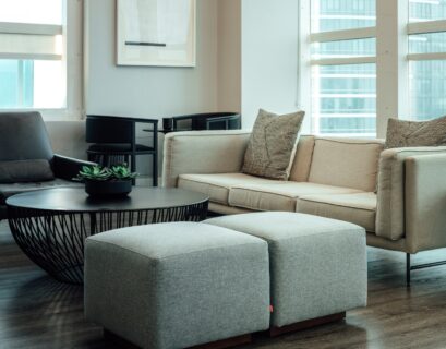gray 2 seat sofa near round table