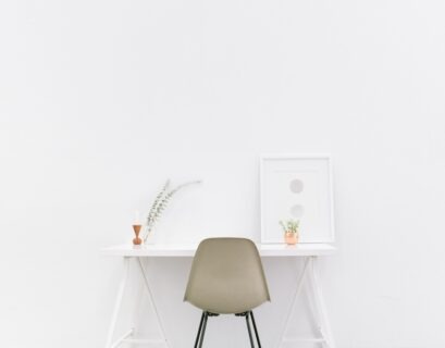 white wooden table near brown chair